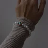 Baroque Pearl Bracelet with Emerald Gemstone