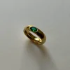 Gold Ring with Oval-encrusted Gemstone - Emerald Green