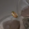 Gold Ring with Oval-encrusted Gemstone - Clear