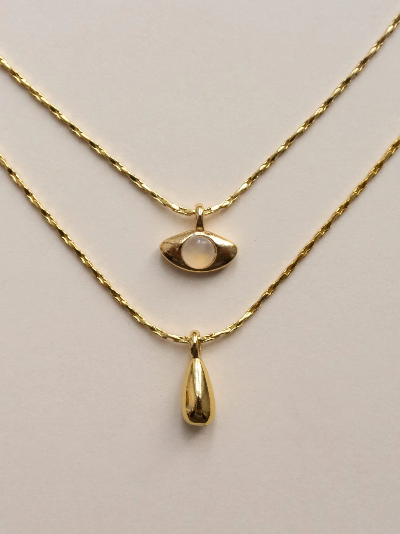 Layered Necklace With Symbolic Pendants - Eye/Teardrop