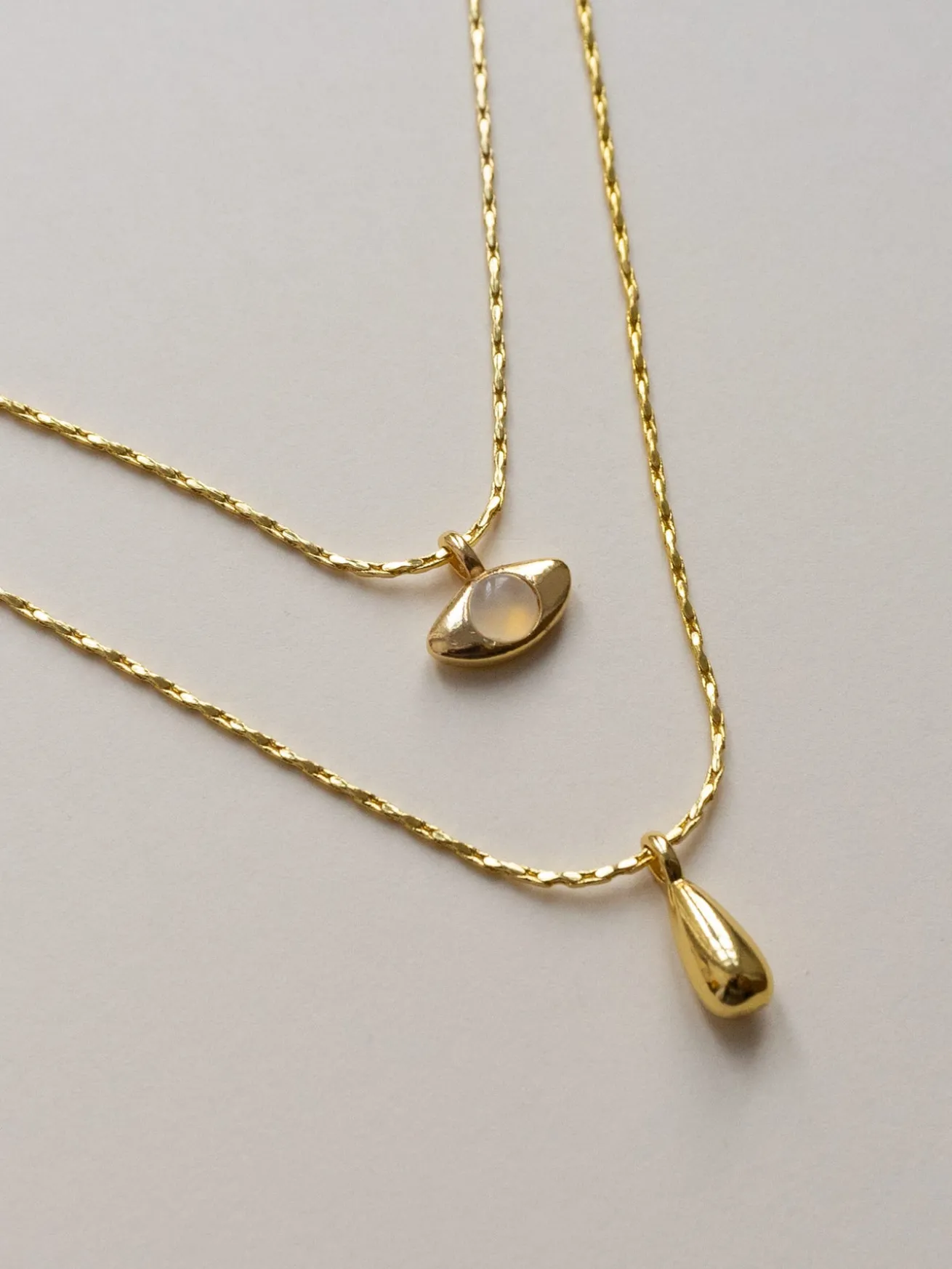 Layered Necklace With Symbolic Pendants - Eye/Teardrop